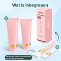 Twee roze tubes met Della collageen nachtmasker 75ml, met gouden dop. Twee witte kwastjes met roze handvatten.