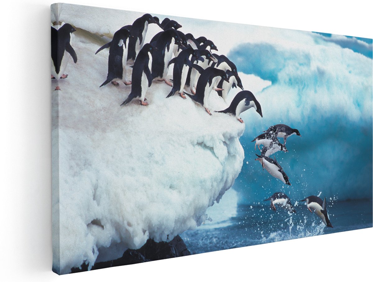 Artaza Canvas Schilderij Kudde Pinguïns Springen vanaf een Rots - 180x90 cm - Groot - Wanddecoratie Woonkamer - Schilderijen - Muurdecoratie