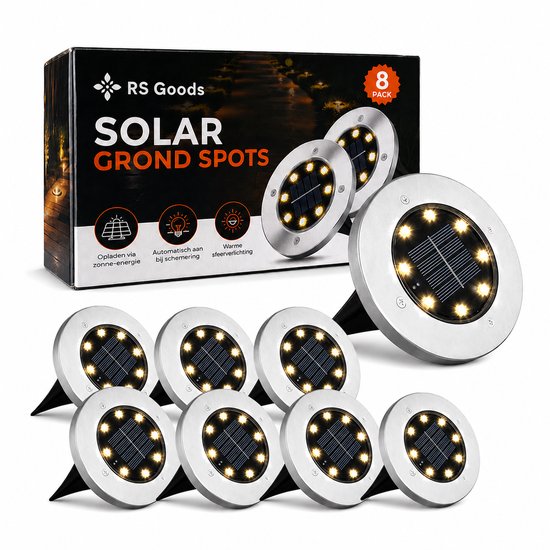 Een verpakking met 8 RS Goods Solar Grond Spots. De spots zijn rond met een zilverkleurig frame en zwart middenstuk met LED's en zonnepaneel. De doos toont de tekst "SOLAR GROND SPOTS".