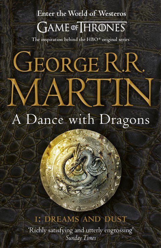 Boekomslag: George R.R. Martin, A Dance with Dragons, met een gouden draakornament op een donkere, lederachtige achtergrond.