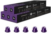 Twee pakken Nespresso Arpeggio koffiecapsules met vijf losse paarse capsules op de voorgrond.