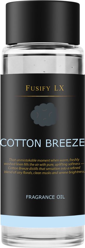 Fusify LX Cotton Breeze geurolie in een helder glazen flesje met zwart deksel. Zwarte wikkel met tekst 'COTTON BREEZE' en een blauwe waas onderaan.