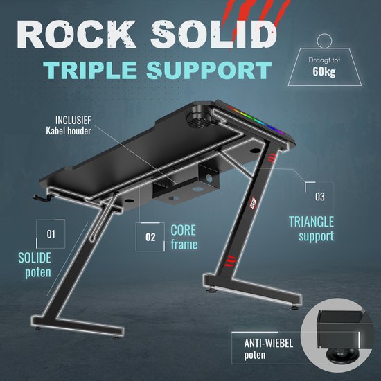Onderstel van een zwarte game bureau met "TRIPLE SUPPORT", "CORE frame" en "SOLIDE poten". Draagt tot 60kg.