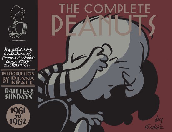 Compleet Peanuts 1961-1962, met Snoopy die zijn gezicht bedekt en accordeon spelende Charlie Brown.