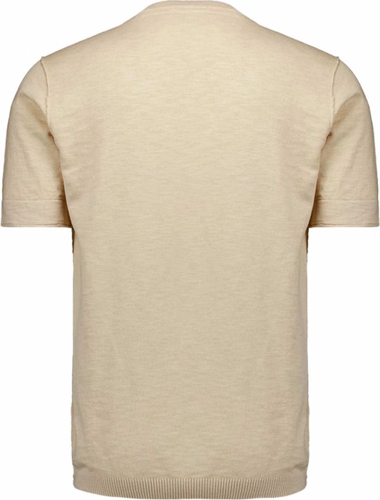Dos d'un haut tricoté beige à manches courtes.