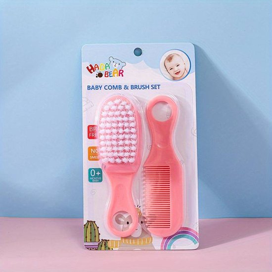 Foto: Babyborstel babykam baby haarverzorging roze kraamcadeau babyhaartjes kammen