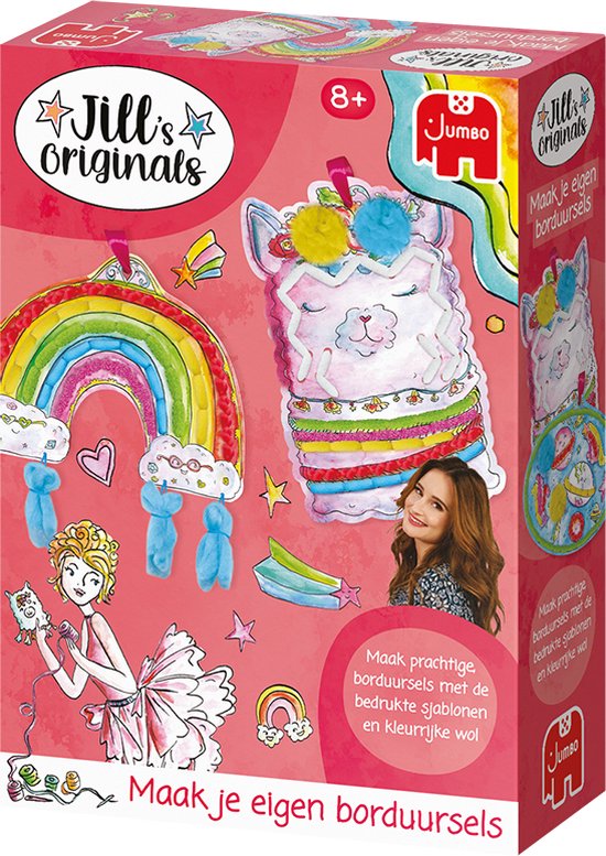 Doos met borduurpakketten: regenboog, lama, ruimteschip. Met meisje dat danst. Tekst: "Maak je eigen borduursels".