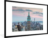 Fotolijst incl. Poster - Het Empire State Building verlicht in New York - 90x60 cm - Posterlijst