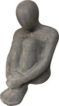 sculptuur man zittendzandsteen hoog 73 cm kleur grijs decoratief