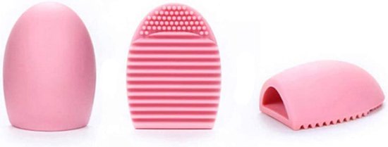Drie roze make-up borstelreinigers: een ei-vormige houder, een gestreepte reiniger en een gebogen houder.