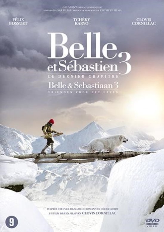 DVD hoes van Belle & Sebastiaan 3. Een jongen met rode muts en hond lopen over een brug in besneeuwde bergen.