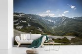Behang - Fotobehang Sneeuw op de bergen van het Nationaal park Hohe Tauern in Oostenrijk - Breedte 420 cm x hoogte 280 cm