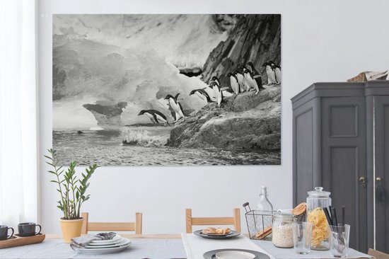 Tableau sur toile Pingouins en Antarctique plongeant dans l'eau - noir et blanc - 150x100 cm - Décoration murale