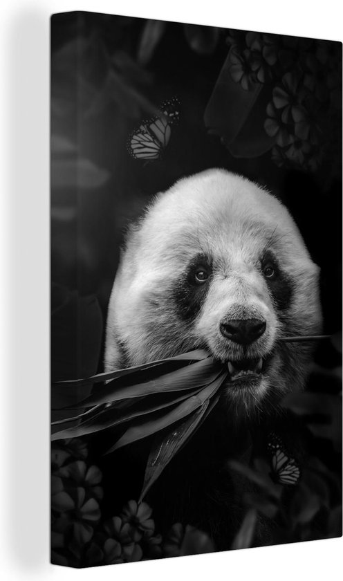 Canvas Schilderij Panda die bladeren eet in de jungle - zwart wit - 40x60 cm - Wanddecoratie
