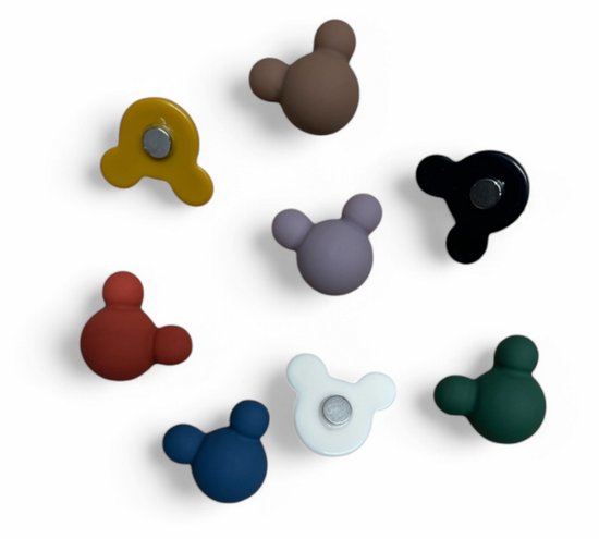 Acht magnetische 3D teddybeer vormen in verschillende kleuren op een witte achtergrond.