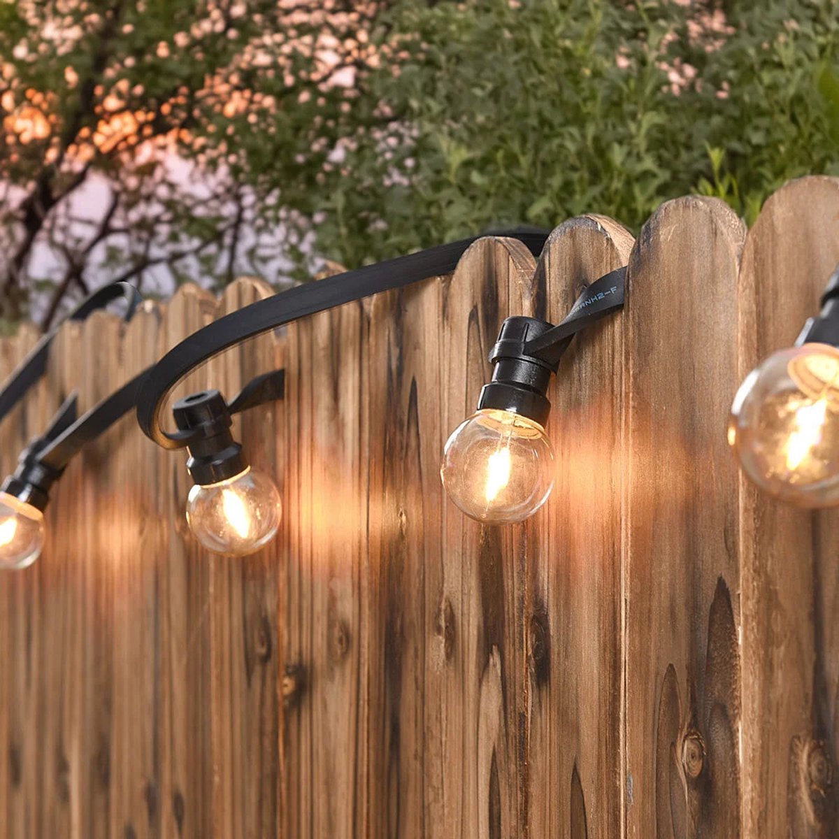 LumenXL lichtsnoer voor buiten 34 meter met 70 2 watt driehoek filament LED lampen 2700K - rubber