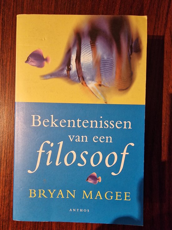 Boek 'Bekentenissen van een filosoof' door Bryan Magee. De omslag heeft een gele en blauwe achtergrond met een paars figuur.
