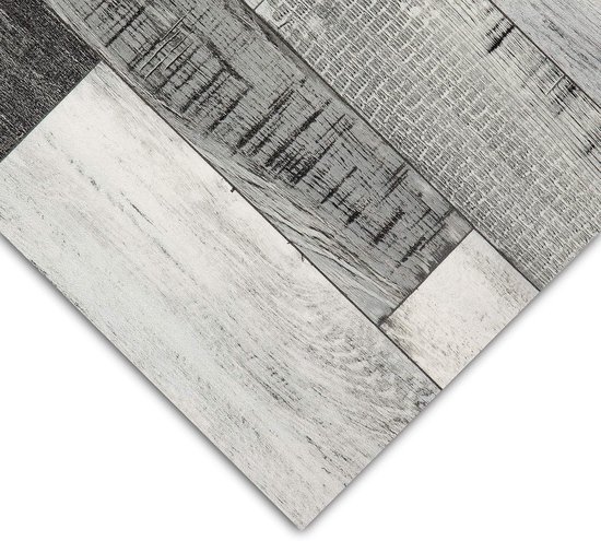 Planches de parquet vieillies dans des tons gris et blanc.