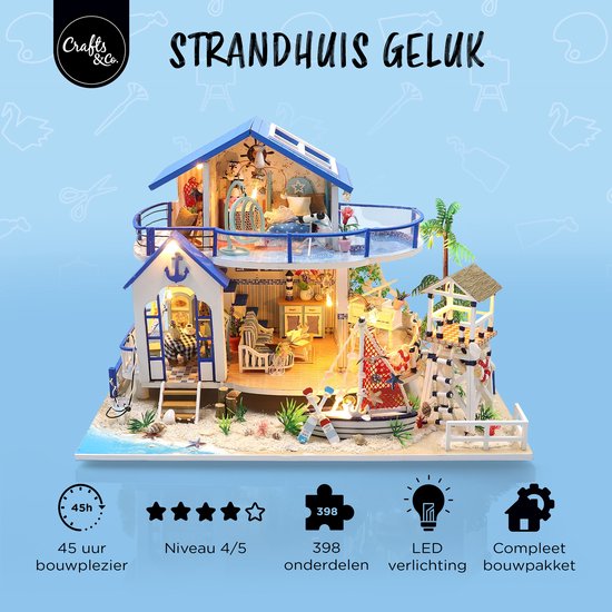 Knutselpakket miniatuur strandhuis 'Strandhuis Geluk'. Met 398 onderdelen, LED verlichting, 45 uur bouwplezier. Nv 4/5.