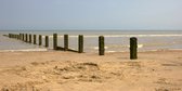Tuinposter - Zee / Water - Strand in wit / grijs / zwart / blauw / groen / bruin / beige - 100 x 200 cm
