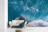 Behang - Fotobehang Blauwe golven bij Kelingking Beach in Indonesië - Breedte 420 cm x hoogte 280 cm