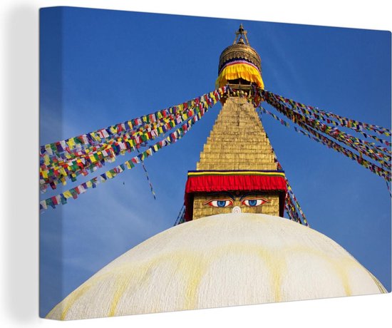 Canvas Schilderij Gebedsvlaggen aan de gouden stoepa in Kathmandu - 60x40 cm - Wanddecoratie