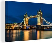 Canvas Schilderij De Tower Bridge verlicht in de avond in Engeland - 120x80 cm - Wanddecoratie