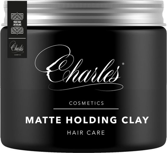 Charles Matte Holding Clay