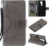 Voor Xiaomi Redmi 9 Totem Bloem Reliëf Horizontale Flip TPU + PU lederen tas met houder & kaartsleuven & portemonnee (grijs)