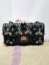 zwarte schouder - en handtas met details
