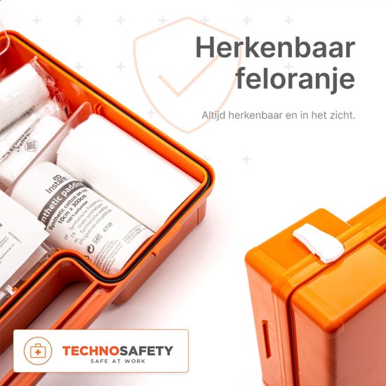 Oranje verbanddoos, gevuld met diverse verbandmiddelen. Gemaakt van feloranje materiaal.