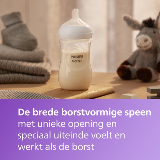 Philips Avent babyfles met brede, borstvormige speen, gevuld met melk.