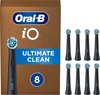 Bruine verpakking van Oral-B iO Ultimate Clean met acht zwarte opzetborstels met blauwe en witte borstelharen.