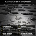 Detailopname van zwarte Walser automatten met waterdruppels, 3D-design.