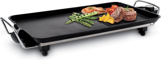 Elektrische grillplaat met biefstuk, zalm en groenten. Heeft een glad en een geribbeld gedeelte, metalen handvatten en een knop voor temperatuurregeling.