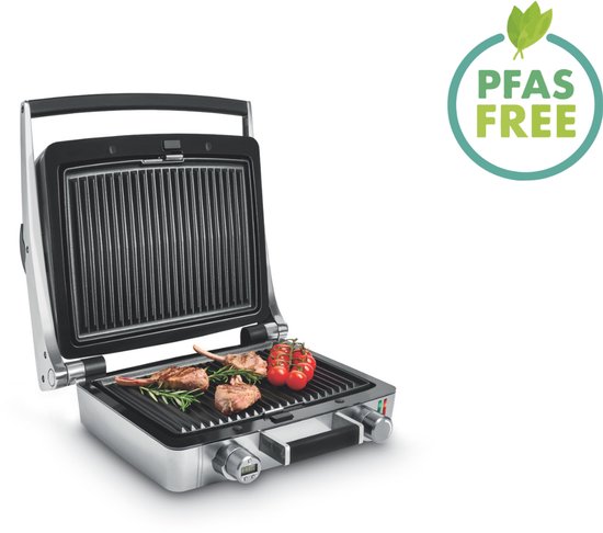 Open Fritel combi wafelmaker en grill met vlees en tomaat op de grillplaten. Groene 'PFAS FREE' cirkel rechtsboven.