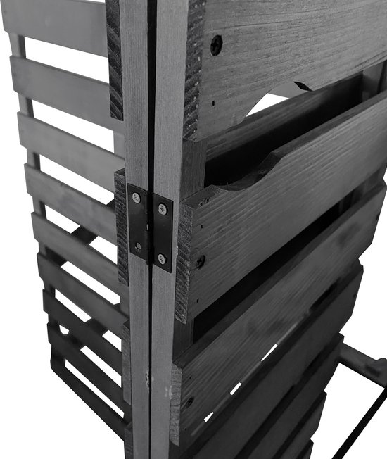 Detail van de scharnieren op een grijze houten containerombouw met lattenstructuur.