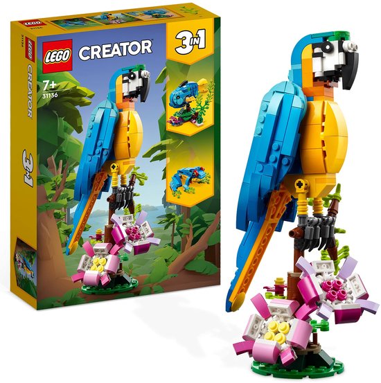 Doos van LEGO Creator 3in1 met een blauw-gele papegaai, een blauwe vis en een blauwe kikker.