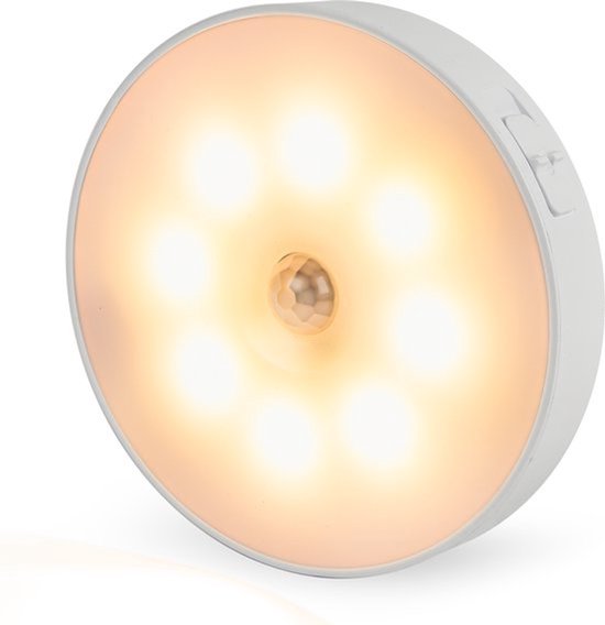 Wit rond nachtlampje met 7 warm witte LED's en bewegingssensor.