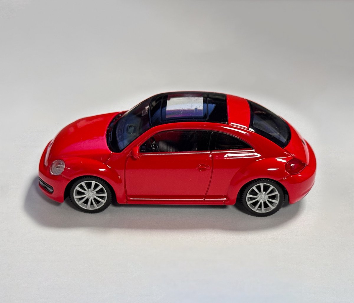 Schaalmodel VW de Kever (schaal 1:43, ca. 10x4x3 cm, rood)