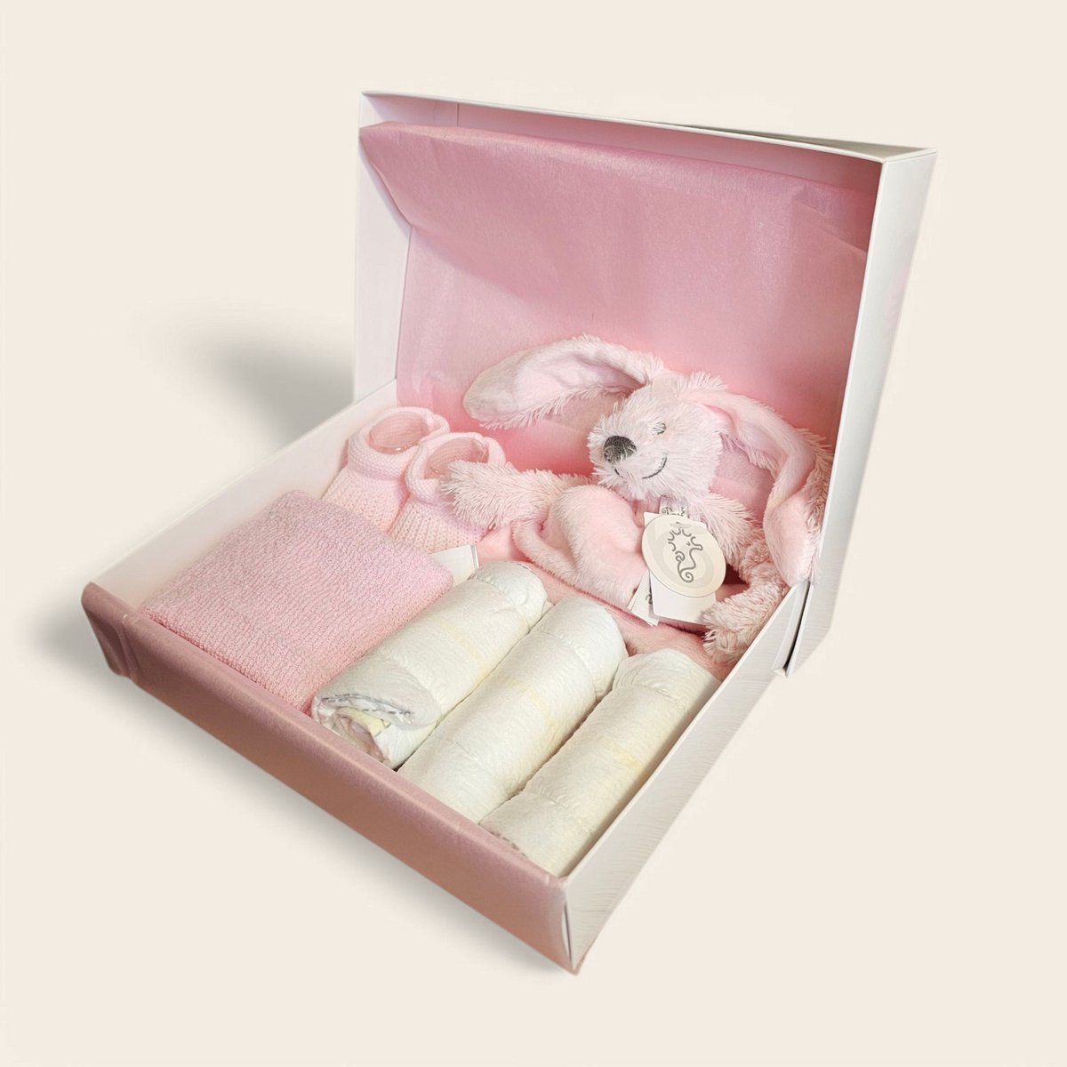 Kraamcadeau roze met Happy Horse Richie Knuffeldoekje, spuugdoekje slofjes en pampers