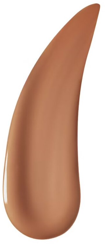 Een druppel van lichte bruine concealer, geïsoleerd op een witte achtergrond.