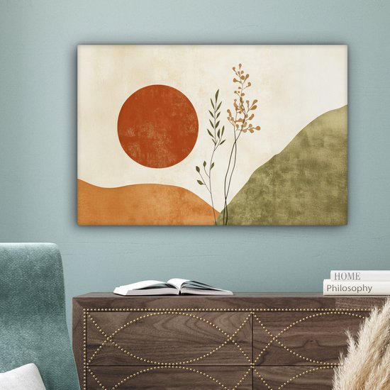 Abstract schilderij met oranje zon, takken en groene heuvels, hangend boven een houten kast.
