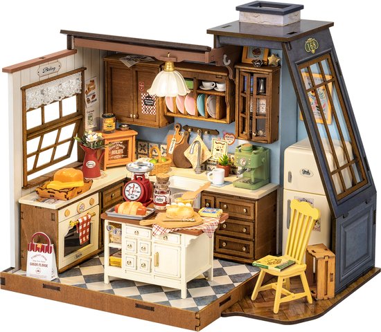 Gedetailleerde miniatuur bakkerijke met meubels, apparaten en bakproducten.