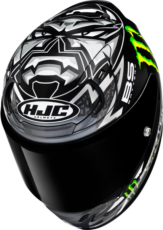 Zwarte HJC integraalhelm met witte en groene Monster Energy graphics en een zwart vizier.