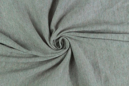 Gros plan détaillé du tissu jersey vert passé avec un léger effet chiné.