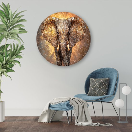 Ronde muurcirkel met een gouden olifant, glitterend met gouden lichtstralen.