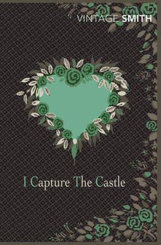Boek 'I Capture The Castle' met een hartvormig groen patroon van bloemen en bladeren op een donkergrijs patroon. Tekst: VINTAGE SMITH, I Capture The Castle.