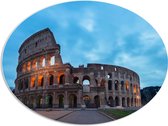 PVC Schuimplaat Ovaal - Zonsondergang achter Colesseum in Rome, Italië - 96x72 cm Foto op Ovaal (Met Ophangsysteem)