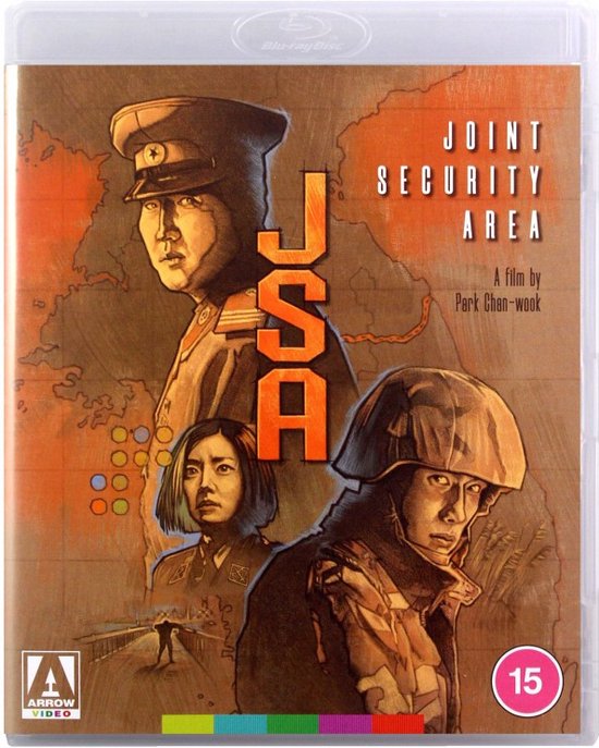Hoes van de film 'Joint Security Area', met drie personages op een achtergrond van een landkaart. De titel staat verticaal in oranje letters.